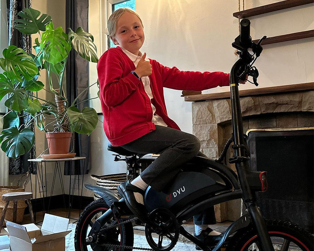a girl is ridng an e bike